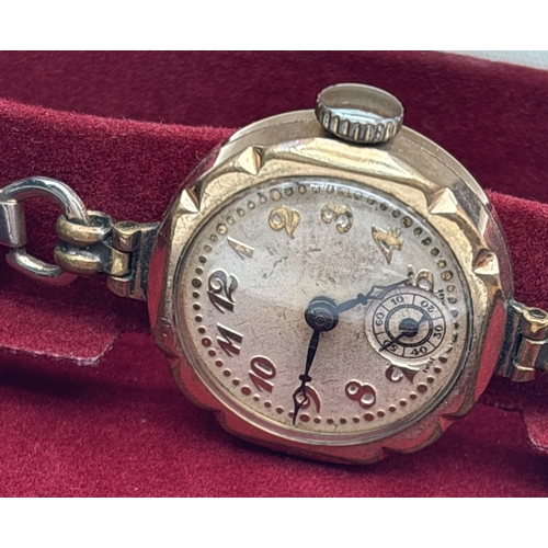 1212 - 2 ladies vintage wristwatches. A rolled gold cased watch on a silver tone expanding strap together w... 