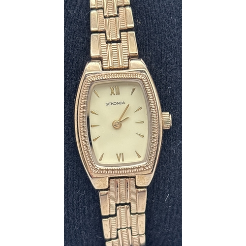 1212 - 2 ladies vintage wristwatches. A rolled gold cased watch on a silver tone expanding strap together w... 