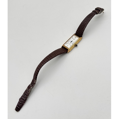 1214 - A ladies vintage slimline Versailles leather strap wristwatch by Oris. Gold plated case with white f... 