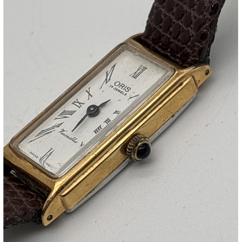 1214 - A ladies vintage slimline Versailles leather strap wristwatch by Oris. Gold plated case with white f... 