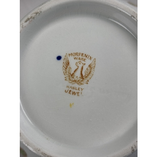 1296 - A Victorian J CLementson Morfenix Ware dinner service in orange & blue colours with floral detail. C... 