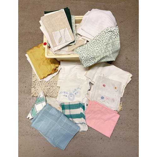 1383 - A box of assorted vintage linen to include table cloths, pillow shams, bed sheets and doilies. Lot i... 