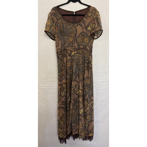 1404 - A vintage 1970's short sleeve 2 layer maxi dress in brown floral polyester. Cut out detail to oversk... 