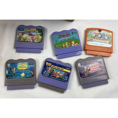 3 - A boxed Vtech V.Smile Motion Active Learning System complete with 9 games, wireless controller & use... 