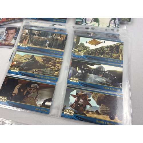 5 - 3 complete Star Wars trading card sets by Topps together with 4 chase cards. Sets comprise complete ... 