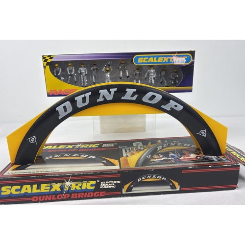 41 - 2 boxed Scalextric accessories, Pit Crew C8294 silver, as new, together with C700 Dunlop Bridge.