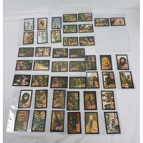 Complete set of Planet of the Apes trading cards (#1-44) by Apjac and A. & B.C., 1968. Printed in UK versions with black borders and green reverse.