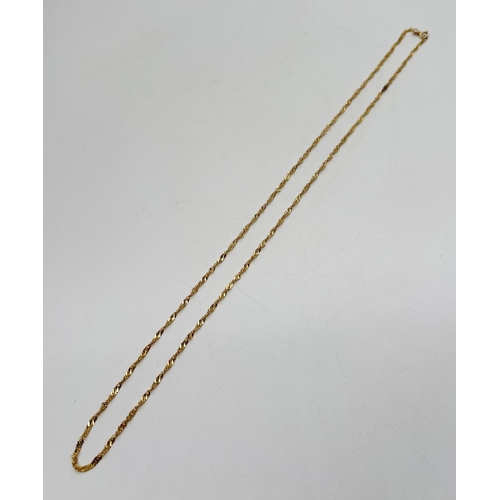 1019 - A 9ct gold 20