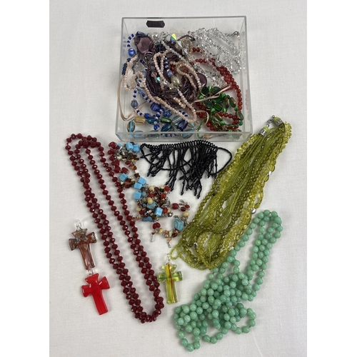 1066 - A tray of glass and glass bead costume jewellery to include necklaces in various colours and designs... 