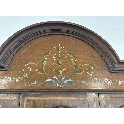 1431 - An Edwardian 2 door glass display cabinet with glazed & panel door, shaped top, tapered legs & spade... 