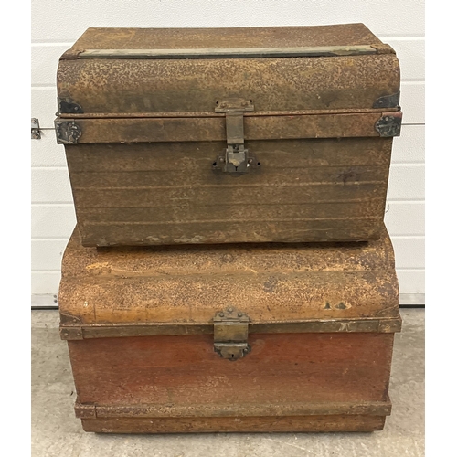 1437 - 2 large vintage metal 2 handled trunks, in rusted condition, with original brass catches. Largest tr... 