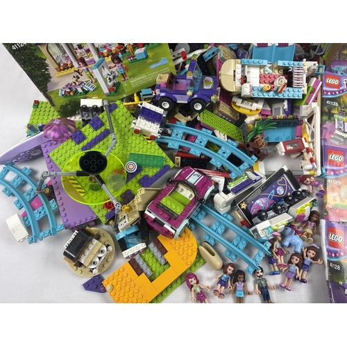 178 - A quantity of Lego friends instructions booklets, Lego, mini figures and accessories from various se... 
