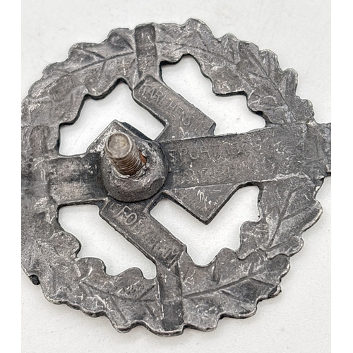 17 - A WWII style German SA sports badge (SA Sportabzeivhen) silver award, with Roman broad sword & oak l... 