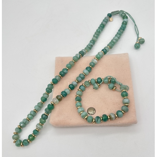 1017 - A faceted bead banded green agate necklace and matching bracelet, by Lola Rose. Both made from round... 