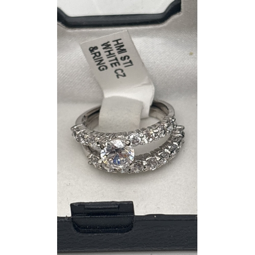 1025 - 4 boxed Cubic Zirconia stone set costume jewellery rings and ring sets by Giani. A square set green ... 