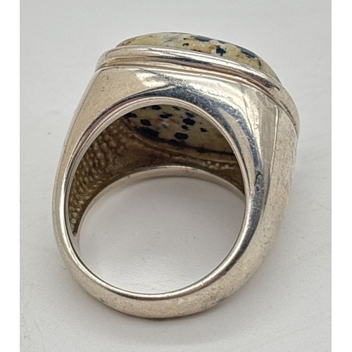 1055 - A large 925 silver and dalmatian obsidian statement ring by Whitney Kelly. Hallmarked inside band wi... 