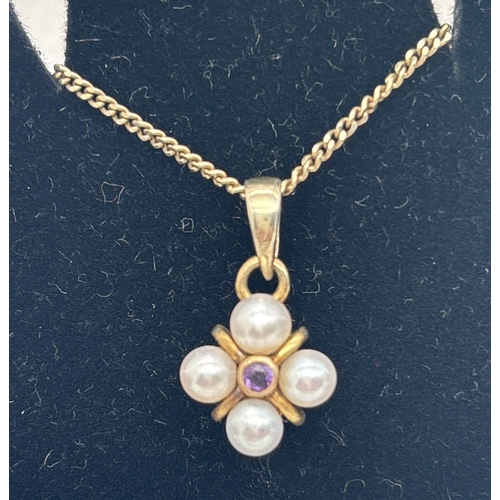1059 - 4 items of pearl jewellery. A silver quatrefoil style pendant set with 4 white pearls and a central ... 
