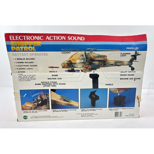 35 - A vintage boxed 1991 Chopper Patrol by Echo, with light and sound action. One red missile missing. T... 
