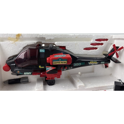 35 - A vintage boxed 1991 Chopper Patrol by Echo, with light and sound action. One red missile missing. T... 