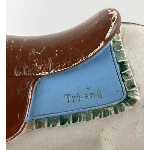 42 - A vintage 1950's child's push along/ride on horse by Tri-ang. A painted white hard plastic horse on ... 