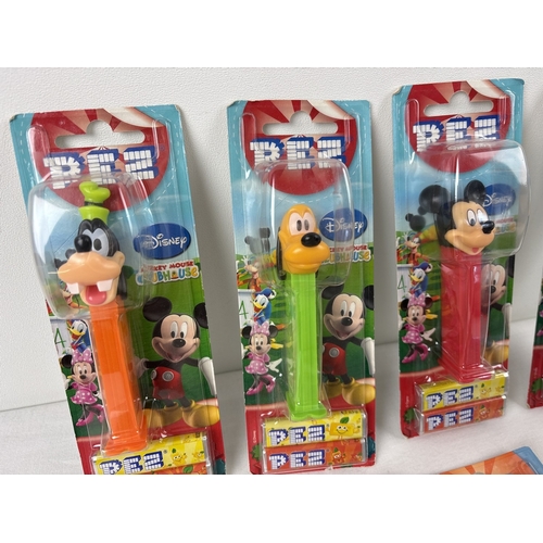 46 - 12 carded Disney charactyer Pez sweet dispenders. Comprising: Planes - Dusty, Mickey Mouse Clubhouse... 