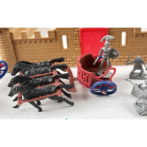 24 - A 1960's small plastic fort together with 2 sets of Knights and soldiers. Lot also includes 2 vintag... 