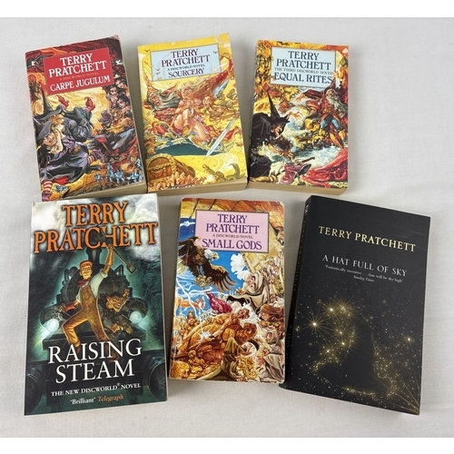 31 - A collection of 11 hardback and 14 paperback Terry Pratchett Discworld novels. All First Editions ap... 