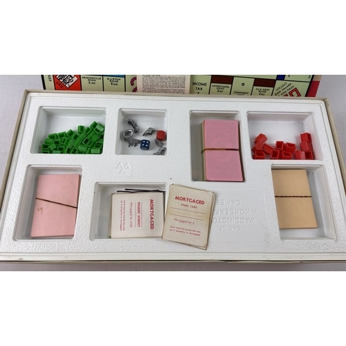 41 - 5 boxed board games. 2 x 1970's Monopoly; 1960's monopoly; Scrabble and Wind In The Willows. Animal ... 