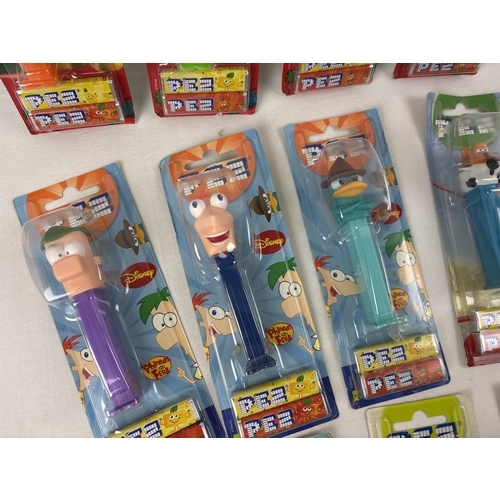 46 - 12 carded Disney charactyer Pez sweet dispenders. Comprising: Planes - Dusty, Mickey Mouse Clubhouse... 