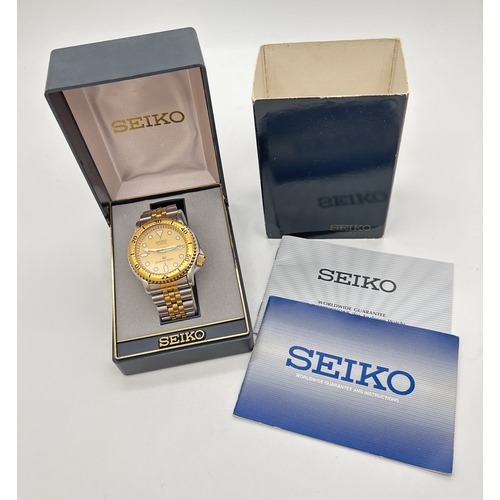 A boxed Seiko Quartz 5H26-7A10 divers watch with rotating bezel 