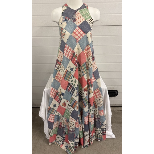 A 1970's sleeveless A line patchwork design maxi dress with deep frill to  bottom by Pat Farrell, Lon
