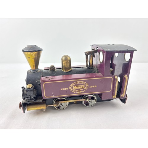 A Mamod steam powered SL6 Ltd edition 50th Anniversary Golden Jubilee Steam Train in maroon with brass features.