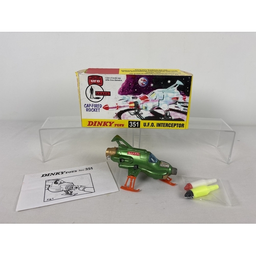 A vintage Dinky Toys Gerry Anderson UFO Interceptor #351, with working cap fired rocket mechanism. Comes with reproduction box, rockets and instructions.