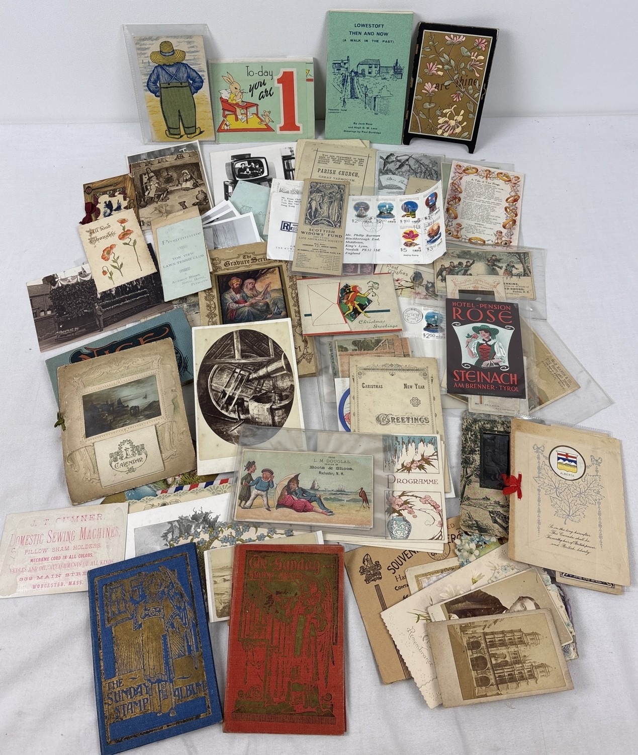 A box of assorted antique ephemera to include photographs, greetings ...