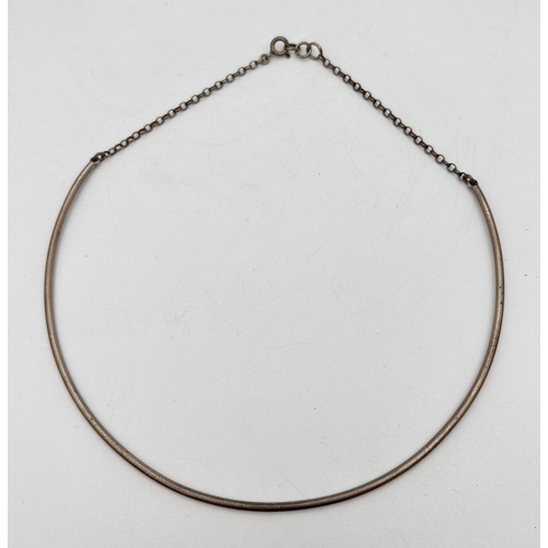 1065 - A modern design 925 silver belcher chain and thin tube collar style necklace. Full silver marks stam... 