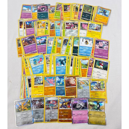 138A - 200 mixed Pokemon trading cards. To include 190 basic and trainer cards, 7 reverse holo's and 3 holo... 
