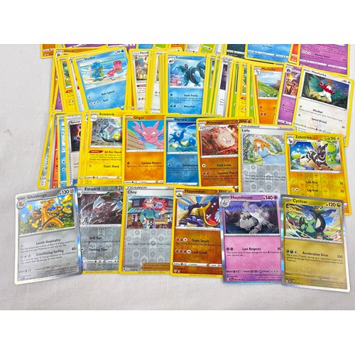 138A - 200 mixed Pokemon trading cards. To include 190 basic and trainer cards, 7 reverse holo's and 3 holo... 