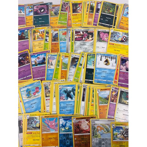 138A - 200 mixed Pokemon trading cards. To include 190 basic and trainer cards, 7 reverse holo's and 3 holo... 