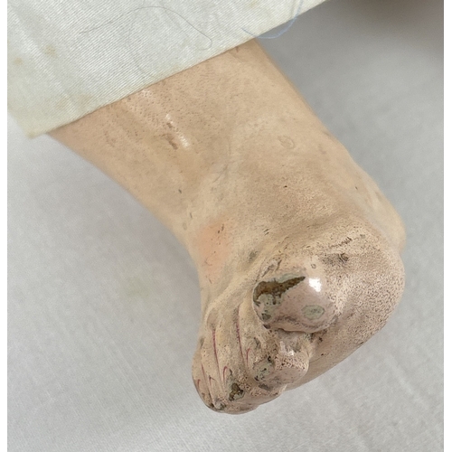 256 - A vintage bisque head Laughing Jumeau doll with composition body and jointed limbs. Closing brown ey... 