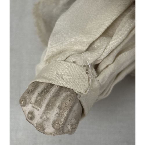 261 - A German Gebruder Knock bisque head boy doll in brown velvet trousers and jacket. Straw filled body ... 