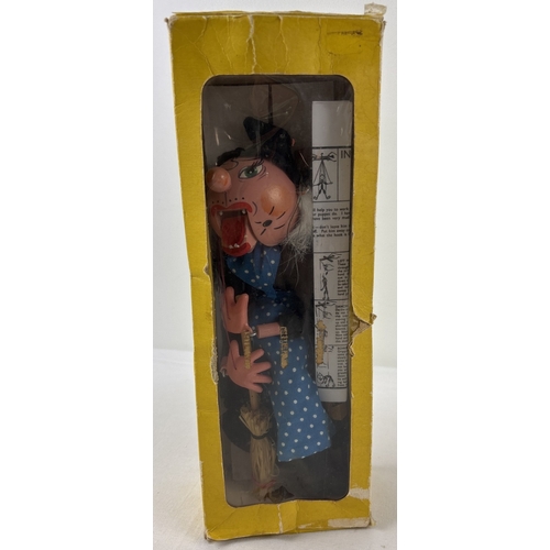 422 - A boxed vintage wooden Pelham Puppets marionette puppet of a witch. Comes with printed instructions.