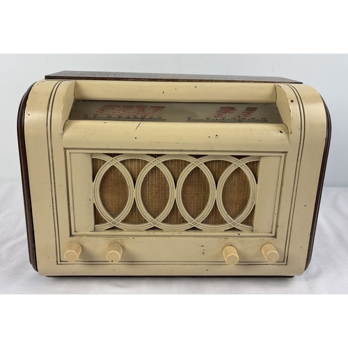 A vintage 1940's His Mater's Voice 1356 MW/LW radio receiver with wooden case, bakelite speaker grill and Marconi tubes. Serial No. 33223. In working order.