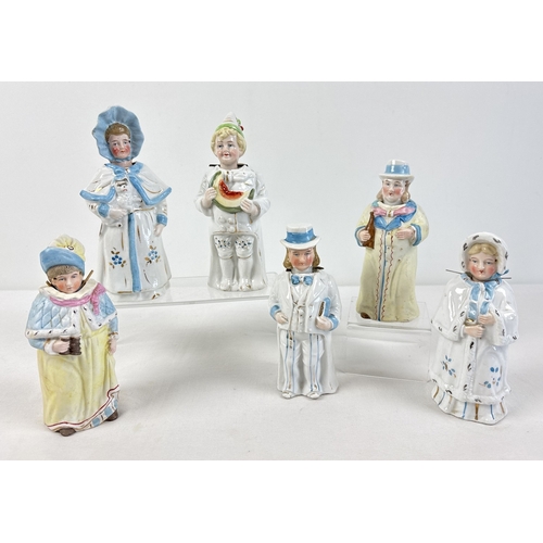 1329 - 6 assorted antique bisque nodder figurines in varying designs and colours, to include a pair in yell... 