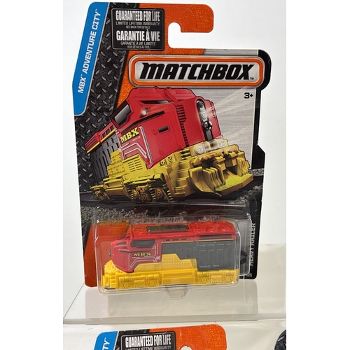 9 assorted Matchbox diecast vehicles, all carded and sealed. To include ...