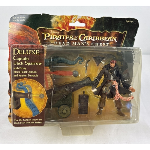 Pirates of the Caribbean Dead Man's Chest Battle on Sea and On Land set, carded & sealed from Zizzle, 2006. Deluxe Captain Jack sparrow figure set containing firing Black Pearl Cannon and Kraken Tentacle.