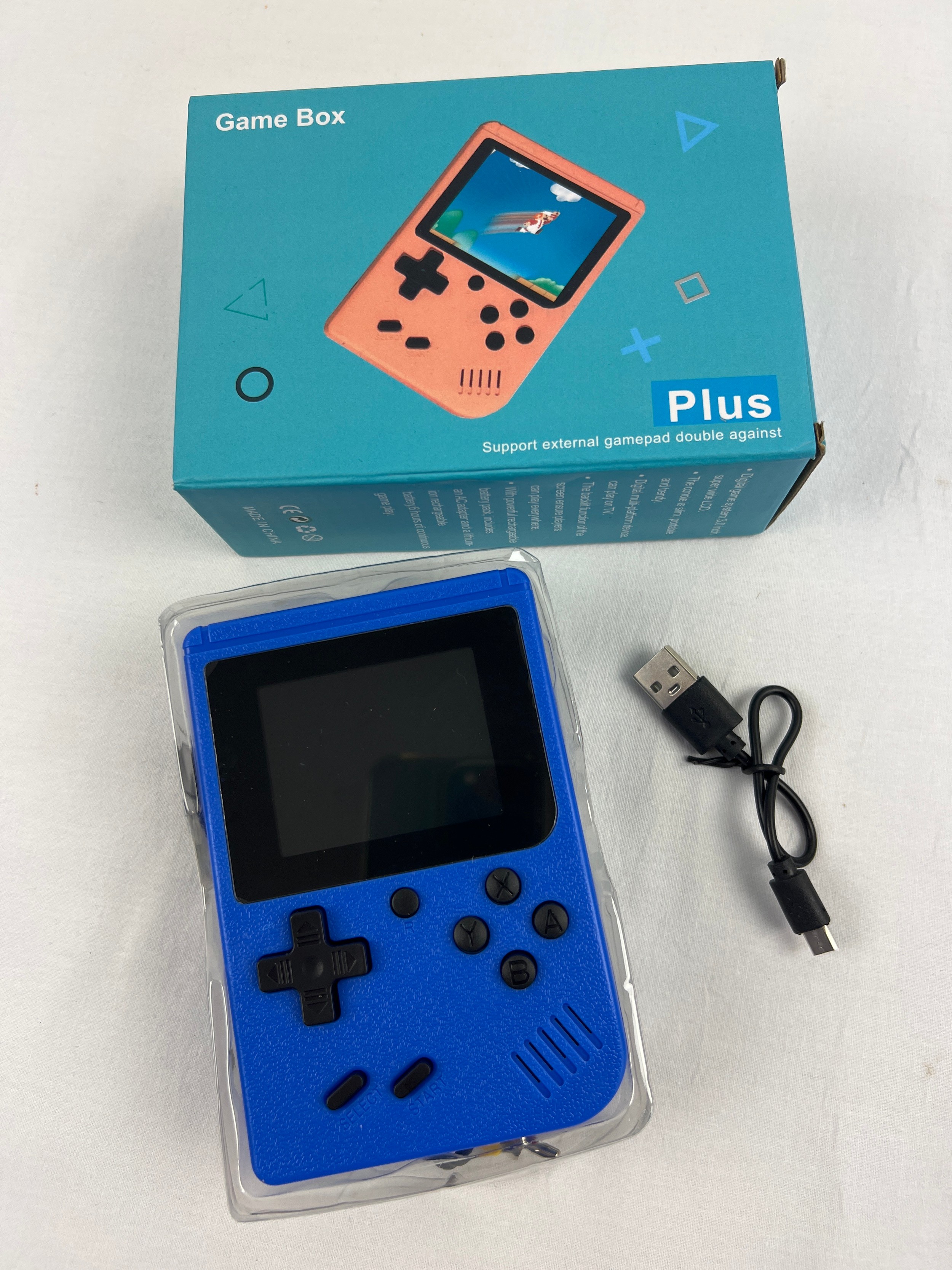 A boxed Game Box Plus Portable Handheld System in blue, with 400 pre ...