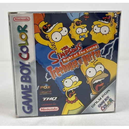 The Simpsons: Night of the Living Treehouse of Horror game cartridge for Nintendo Game Boy Color. Boxed and complete with game manual. Box has interior card insert. Comes with a clear plastic protective display case.