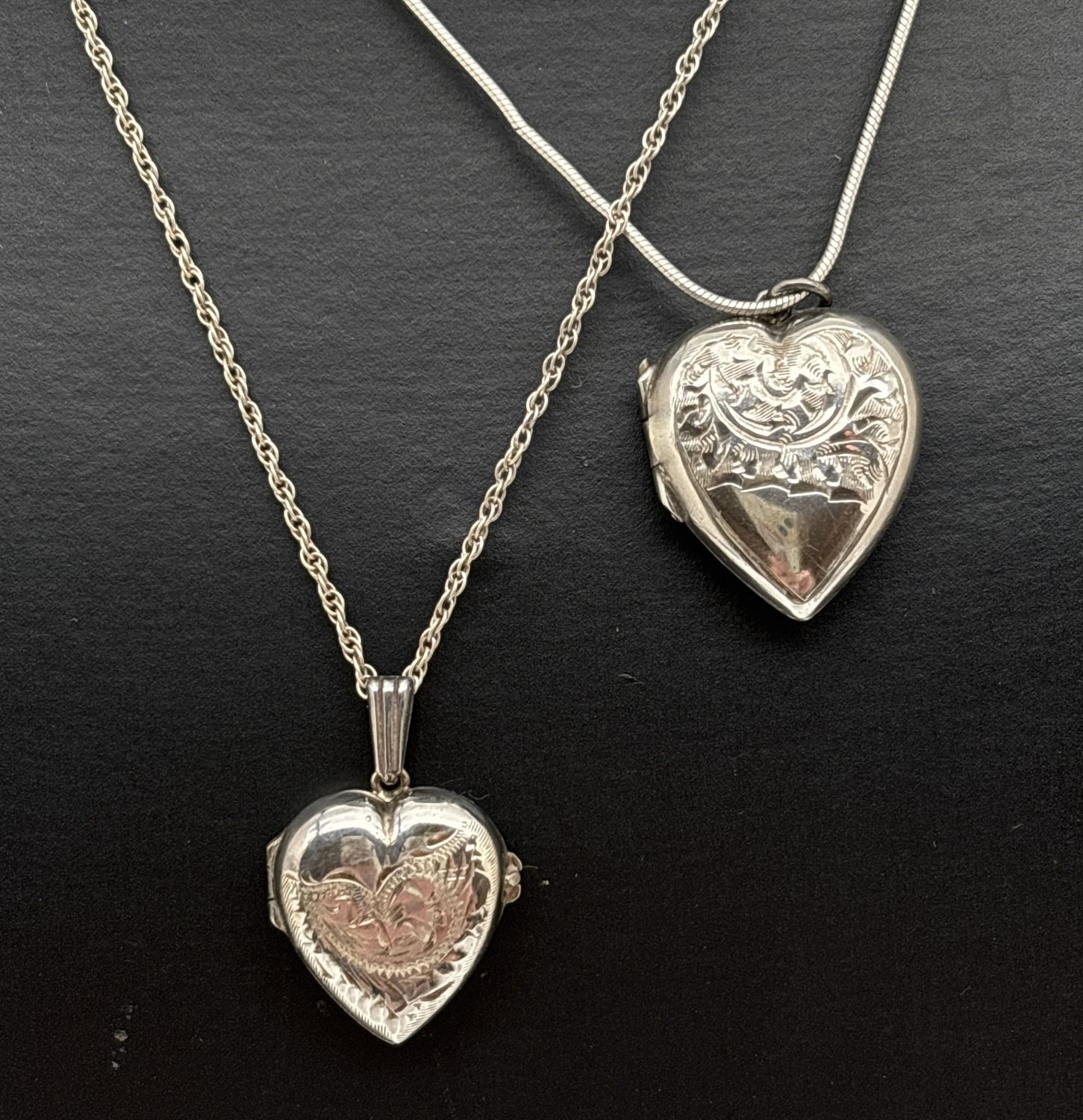 2 vintage silver heart shaped locket necklaces. A locket with half ...