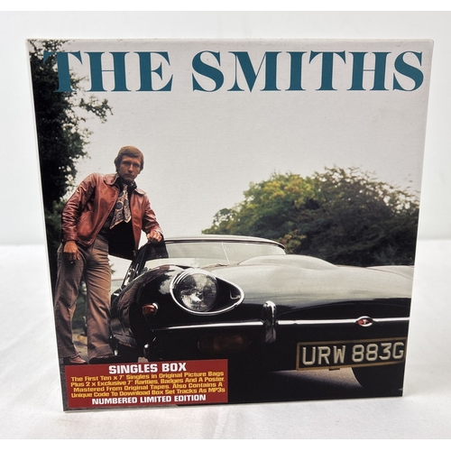 The Smiths - Numbered Limited edition 7" vinyl Singles Box, on Rhino Records (2564-69320-7). Box contains reissues of the first 10 UK issue singles plus the Dutch only release of The Headmaster Ritual and Still Ill / You've Got Everything Now DJ promo. Also contains poster, badges and insert with MP3 download code & contents information.