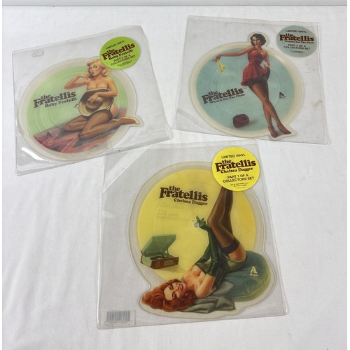 The Fratellis - Limited edition 3 part collectors set, 45 RPM vinyl 8" picture discs from 2006/7. Chelsea Dagger - on Fallout Recordings ‎(FALLOUTLP1), Whistle For The Choir - on   Drop The Gun Recordings ‎(1709878) and Baby Fratelli - on Drop The Gun Recordings (172 383-3), plays at 45 RPM despite record saying 33 RPM. All in original PVC sleeves with hype stickers to front.